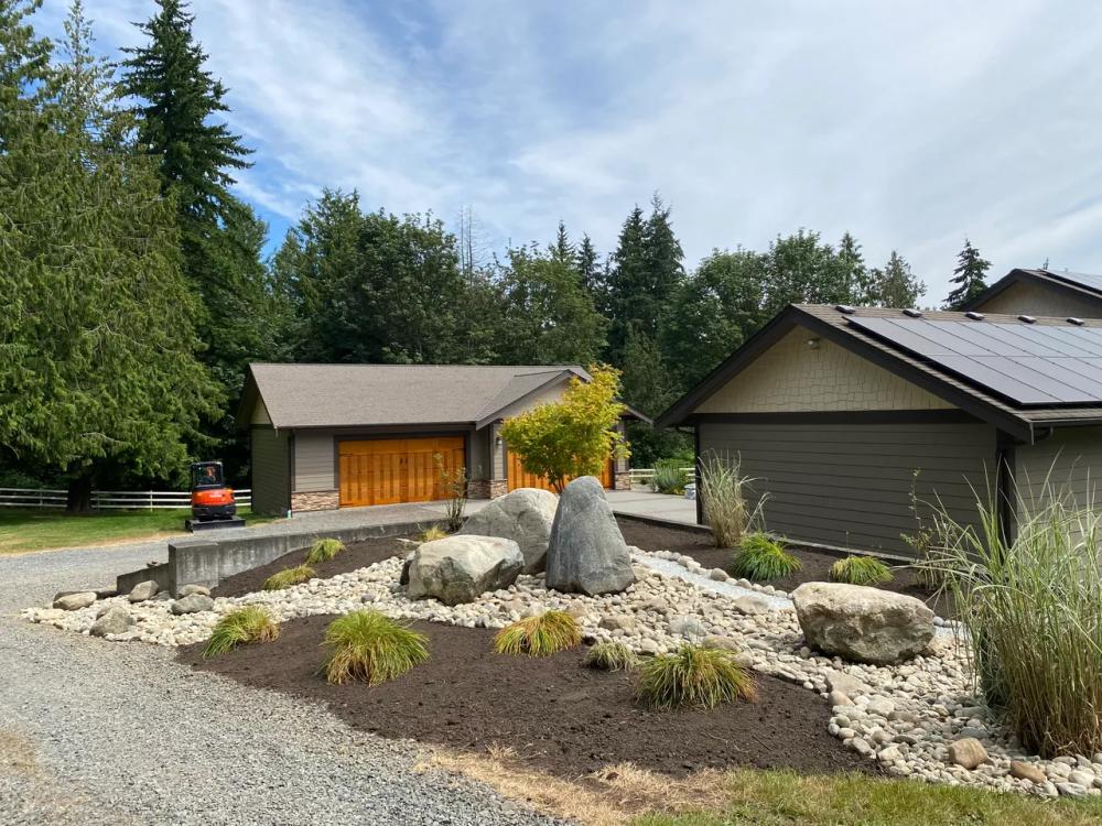 Modern rockery with mixed boulder sizes