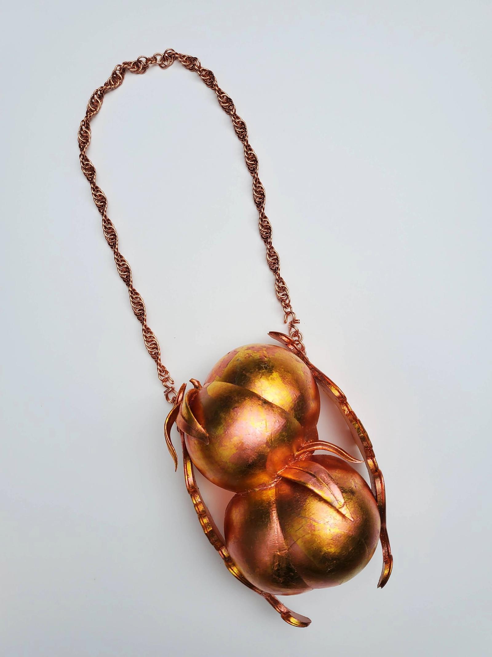 Epaulette peach necklace