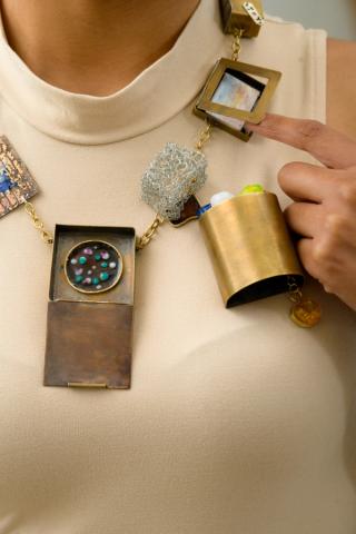 A collection including a necklace and a brooch