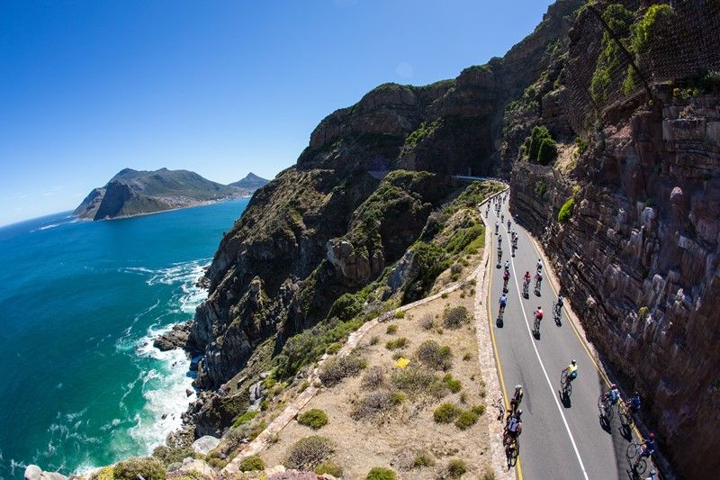 CAPE TOWN, SOUTH AFRICA - MARCH 10, Cyclists ride up Chapmans Peak during the Cape Argus Pick n Pay Cycle Tour 2013 on March 10, 2013 in Cape Town, South Africa