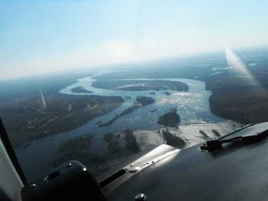 Fly over the mighty Victoria Falls and Zambezi River for unique views