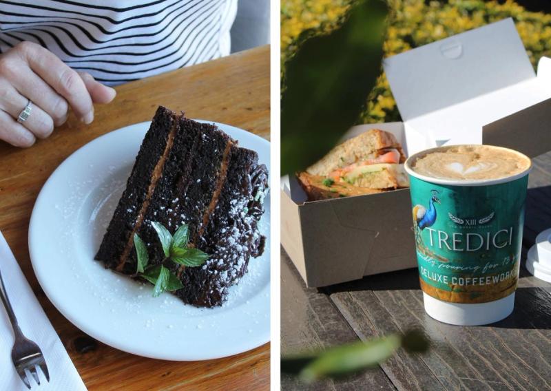 A slice of layered chocolate cake and a takeaway coffee with sandwich in Swellendam