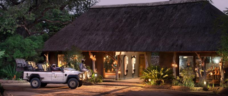 Chitwa Chitwa lodge entrance  with game drive vehicle pulling up