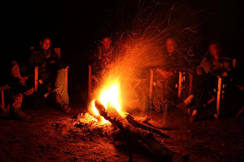 Dinner by camp fire