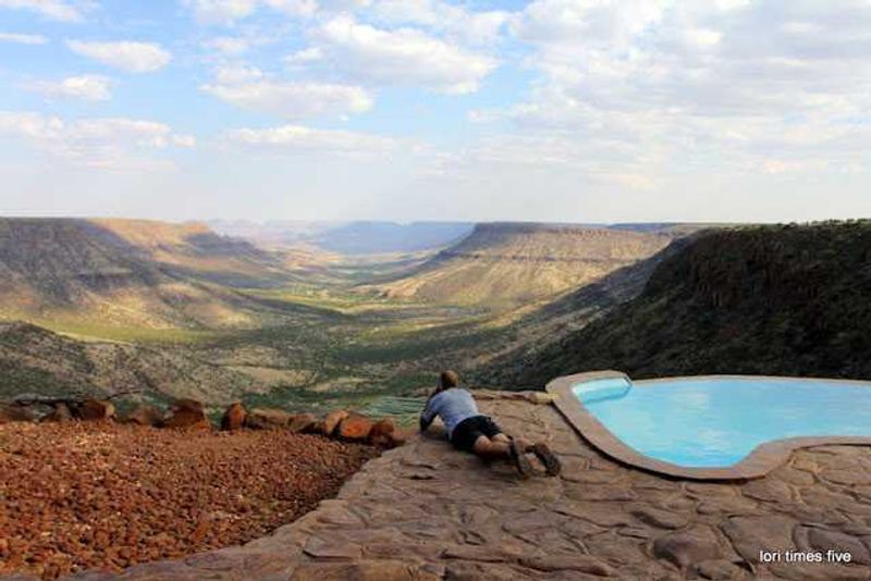 Chuck enjoying the view of the mountainous area of the Etendeka Plateau from the Grootberg Lodge. Lori described the scenery as "dizzingly beautiful."