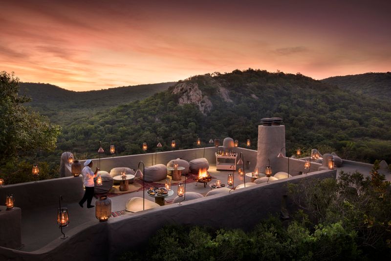 Phinda Rock Lodge dining by lantern light