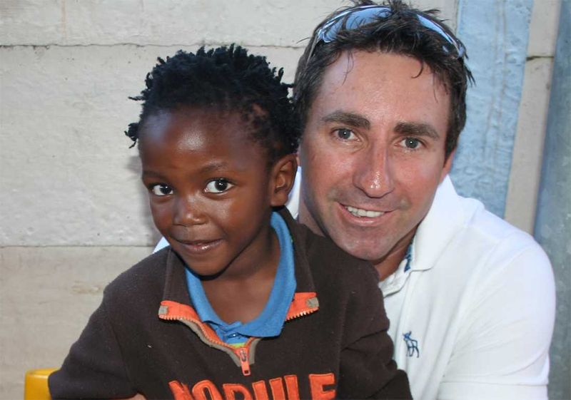 Rhino Africa's Founder & CEO, David Ryan, with the kids at Khumbalani
