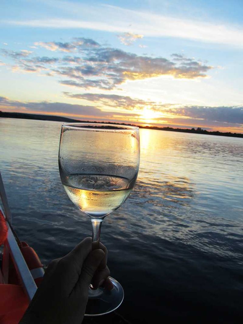 A canoe race back to the main lodge and we were ready for something a tad gentler, so we took once again to the water in what had become our favourite “pastime” – a sunset cruise. There’s something about a gin & tonic, the call of the African Fish Eagle and a tangerine, sunset sky that just has to resonate somewhere in you.