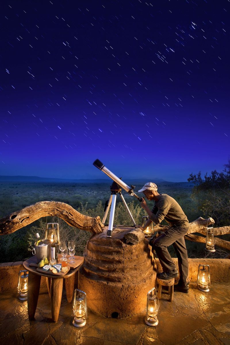 A candle-lit telescope setup at Madikwe Safari Lodge