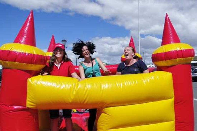 Rhino Africans get in the mood on the jumping castle