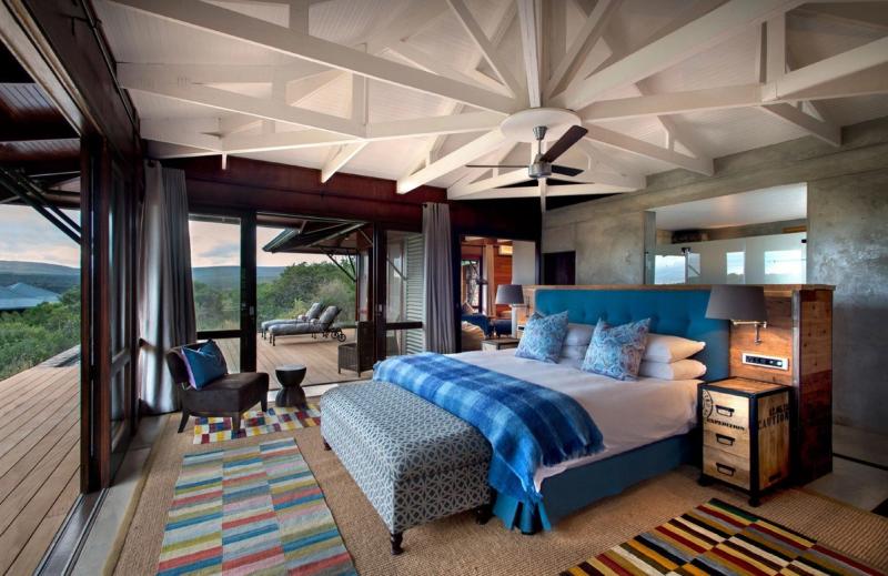A bedroom at Kwandwe Ecca Lodge