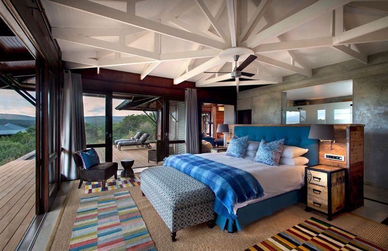 A bedroom at Kwandwe Ecca Lodge