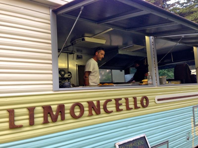 Limoncello Food Truck front with worker serving
