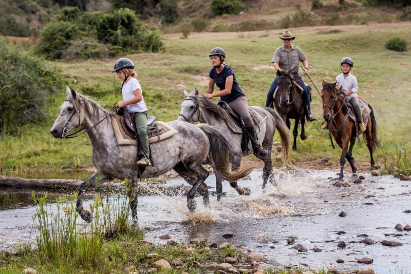 People on a horseback safari in South Africa, Image credit: Botlierskop Game Reserve