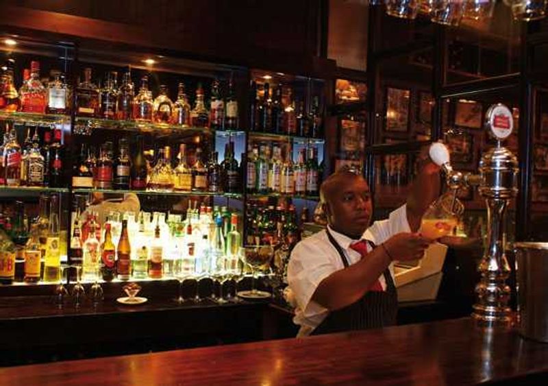 Enjoy a drink at the bar - Hussar Grill, Cape Town