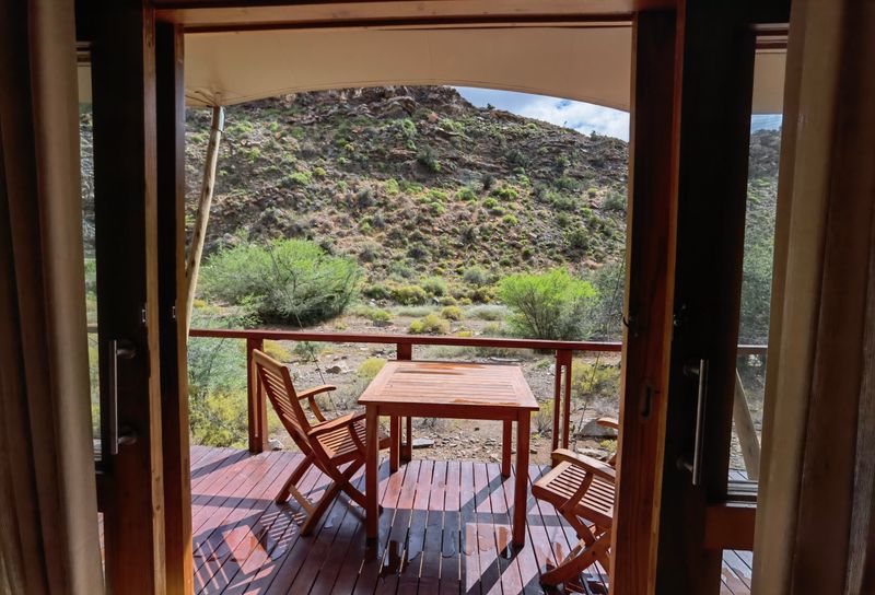 Outdoor verandah at Dwyka Tented Camps at Sanbona Wildlife Reserve