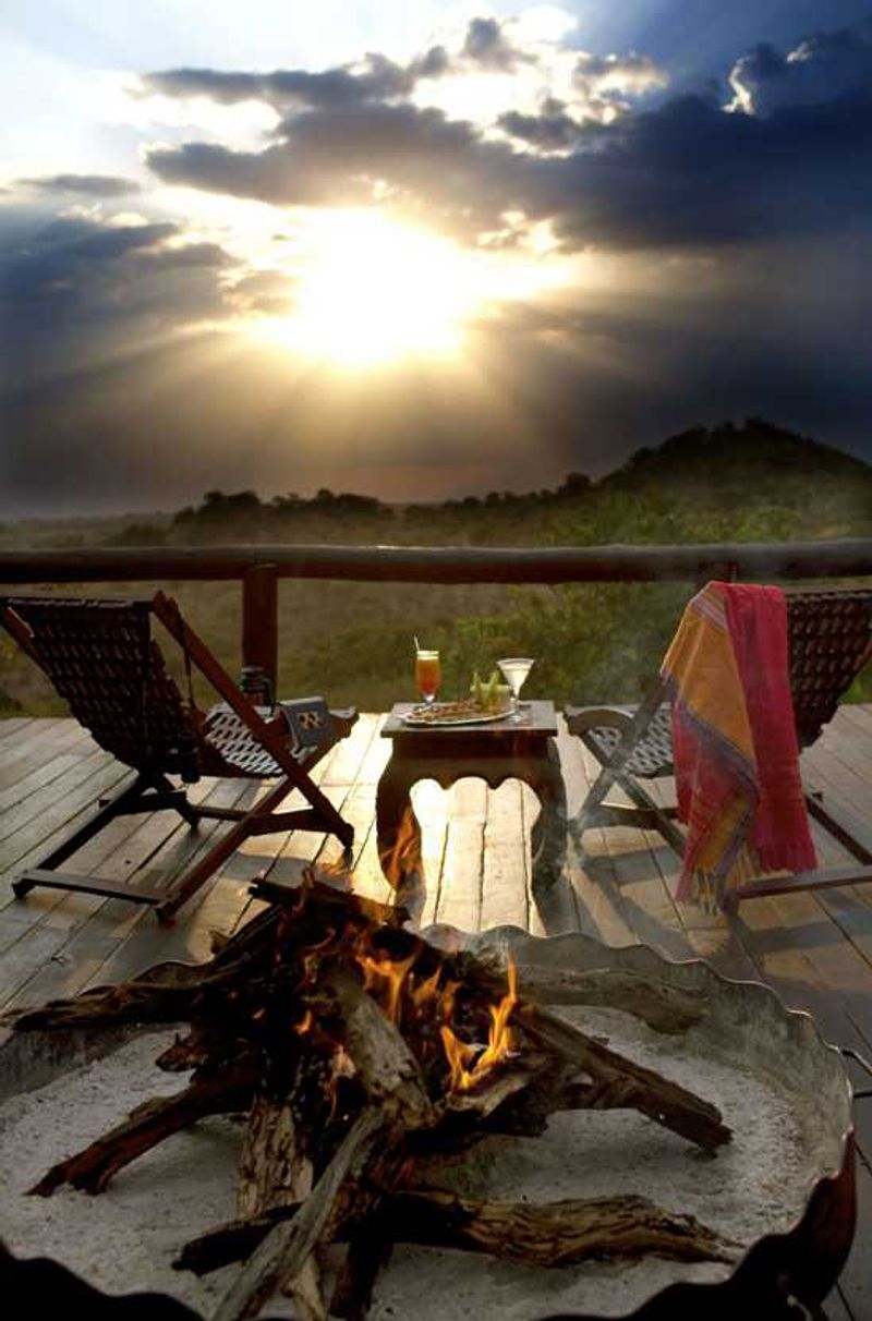 Enjoy sitting around the campfire with sundowners at Serengeti Migration Camp