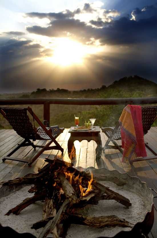 Enjoy sitting around the campfire with sundowners at Serengeti Migration Camp
