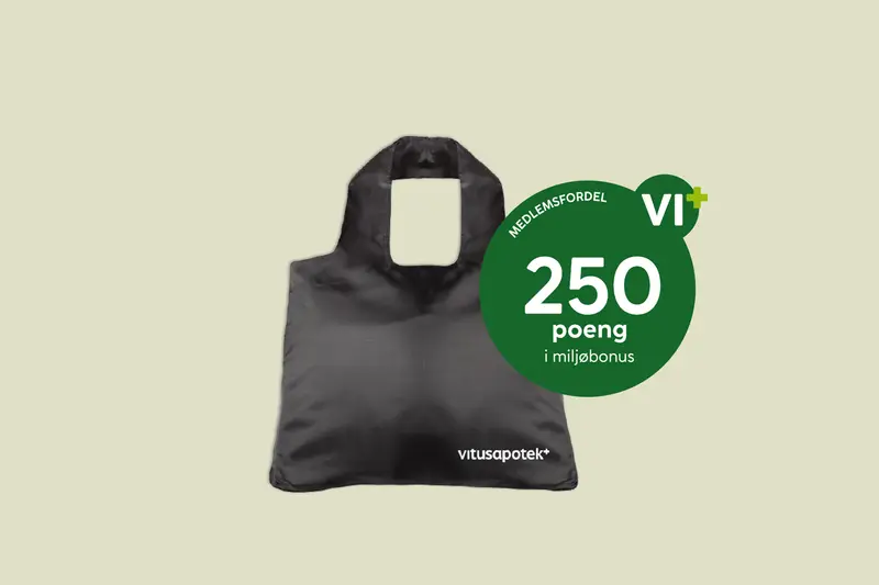 Bildet av en svart gjenbrukspose med Vitusapotek logo