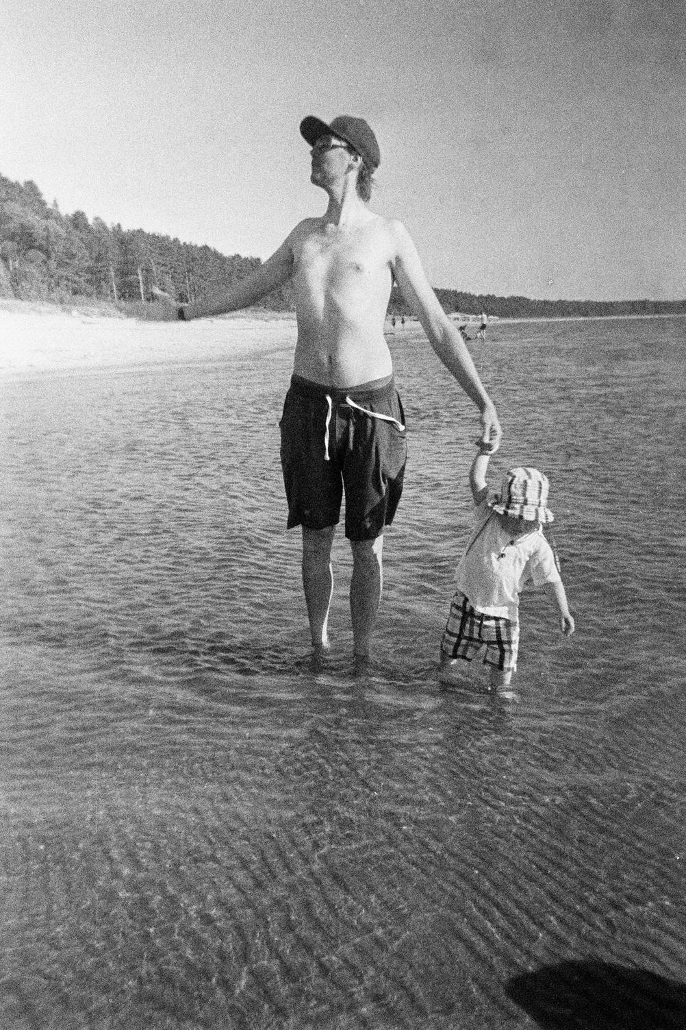Photo of me and my son on the beach.