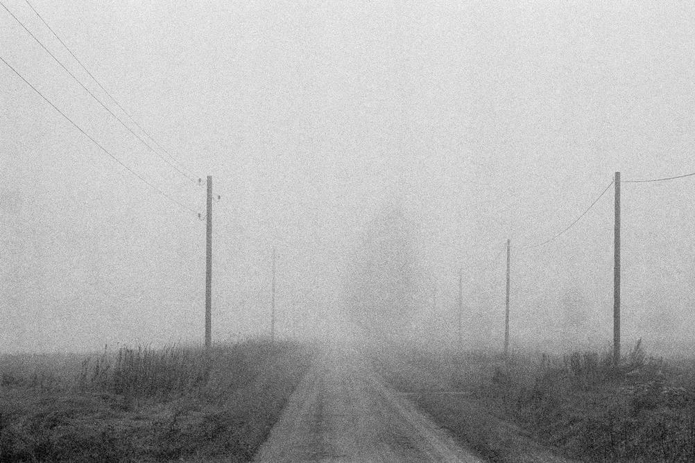 Photo of a misty road.