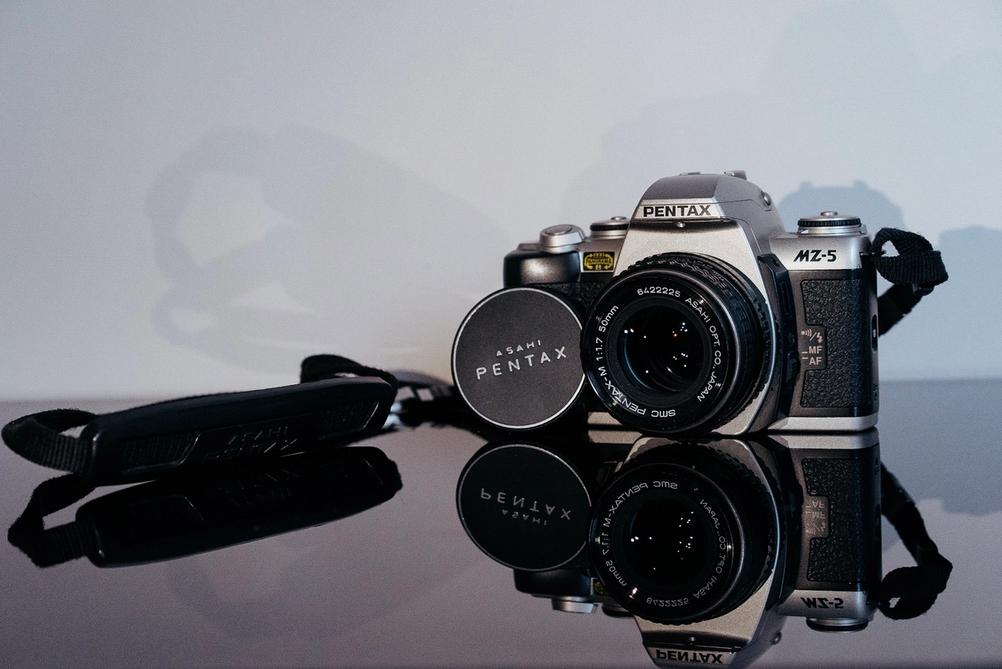 Pentax MZ-5 film photo camera and SMC Pentax-M 50mm f1.7 lens.