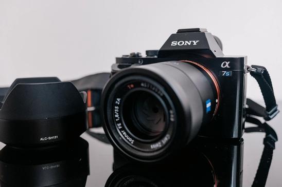 Photo of Sony A7S camera and Sony Sonnar T* FE 55mm f1.8 lens.