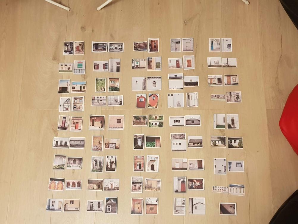 Photo of small prints ordered and laid out on how they will appear in the book.