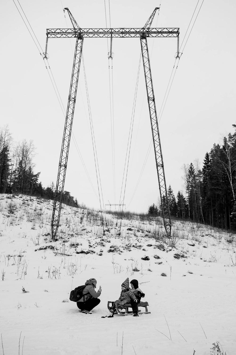 Photo of my family in front of a huge transmission line.