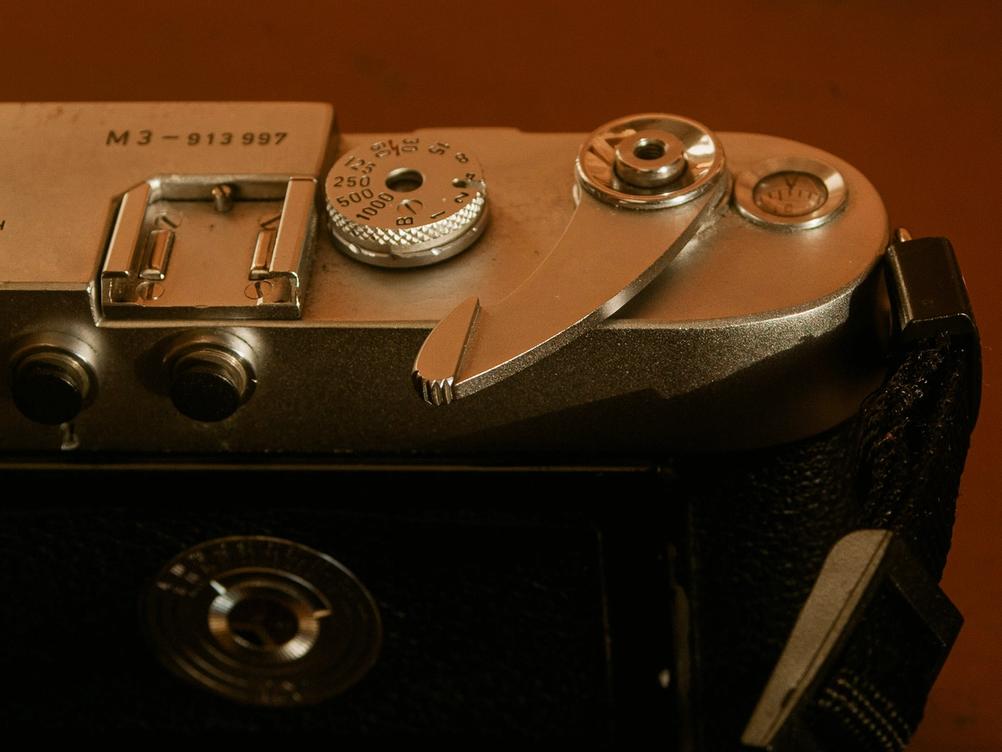 Photo of Leica M3 film advance lever that looks like a male penis.