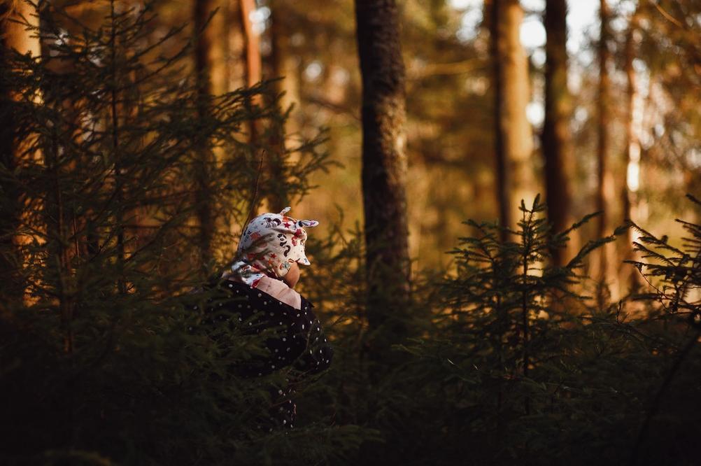 Photo of my daughter in the forest.