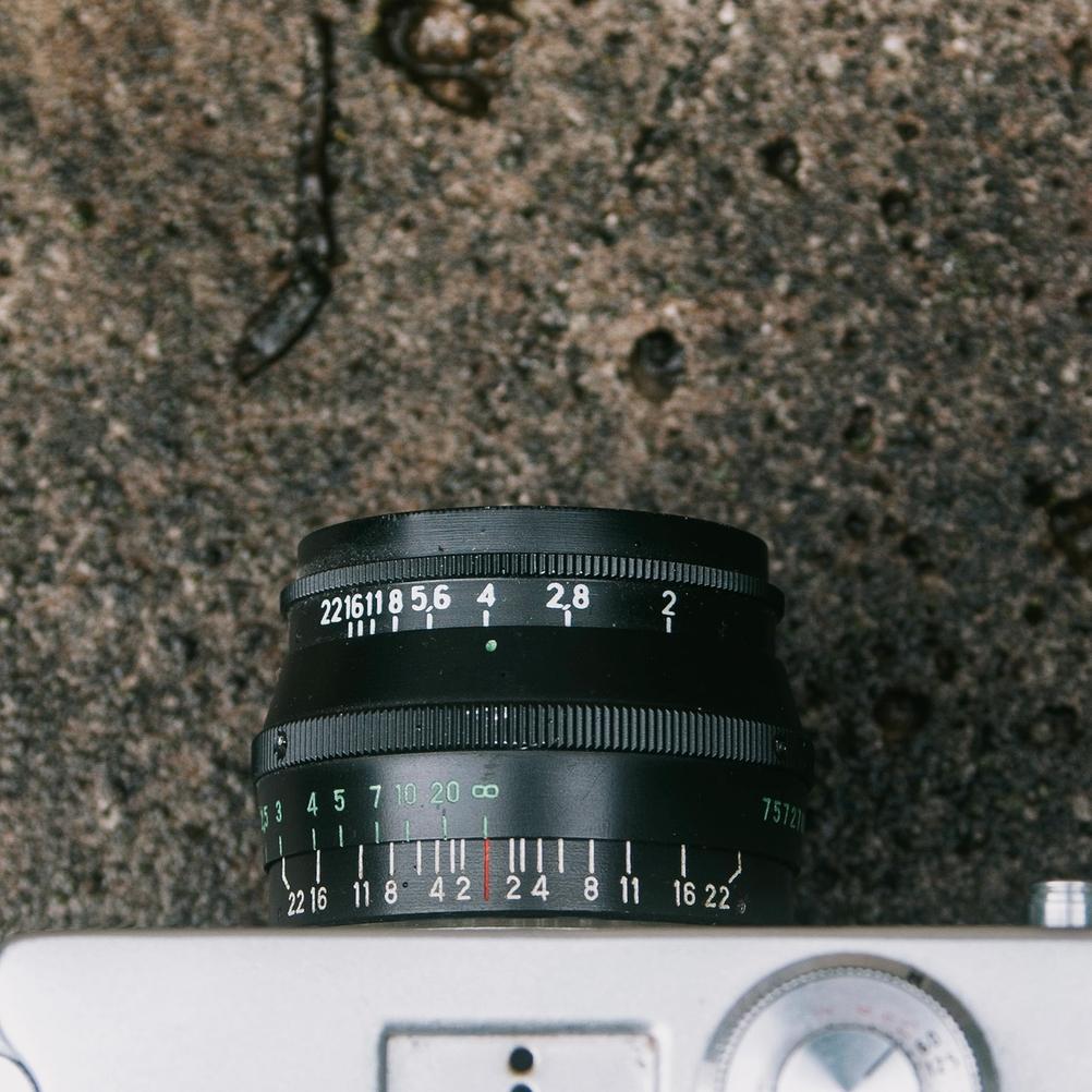 Closeup photo of a black Jupiter-8 50mm f2 lens.