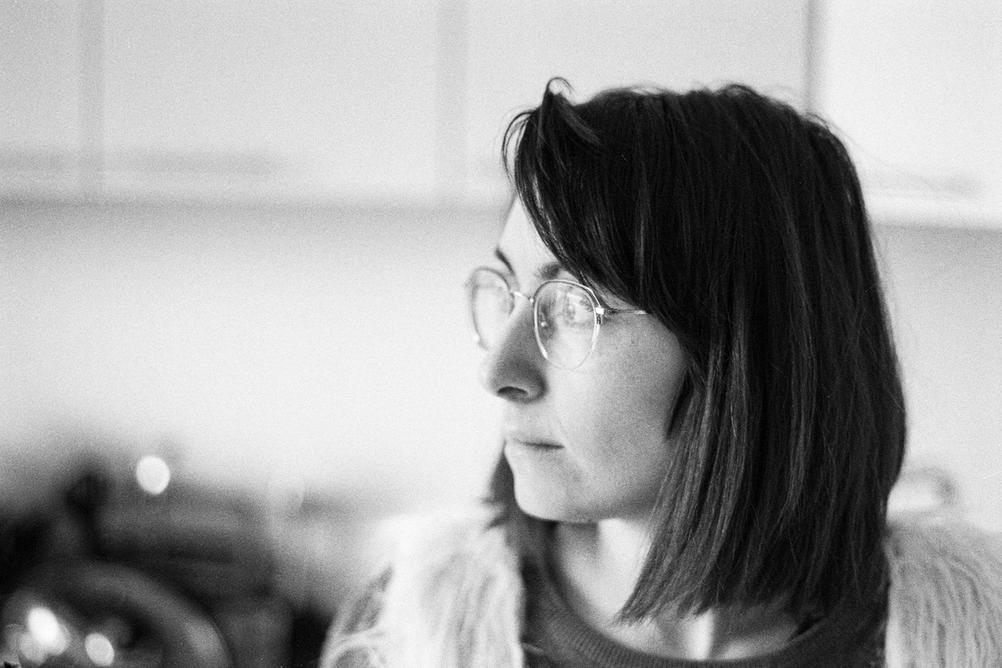 Photo of my wife with focus on glasses.