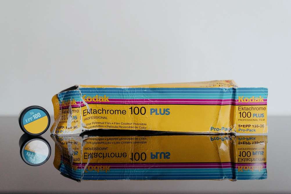 Kodak Ektachrome 100 Plus film canister and box.