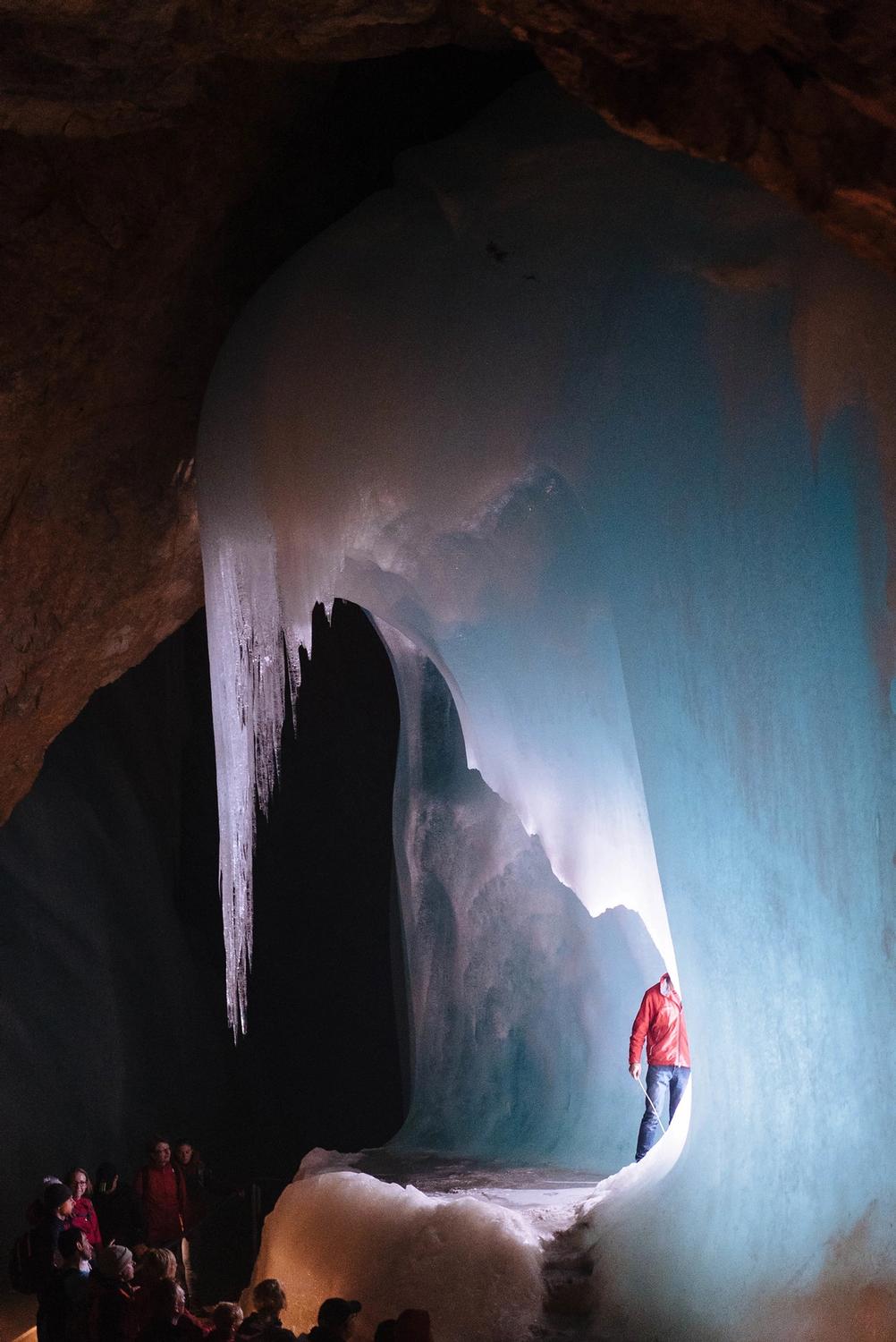 Photo of an ice element in a cave that looks like a women.