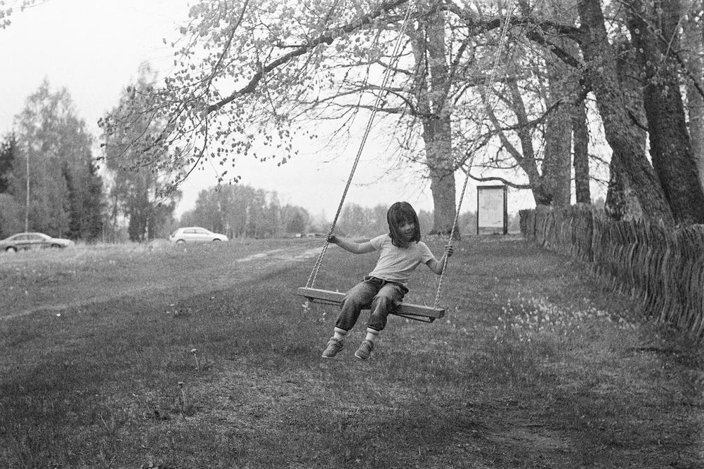 Photo of my daughter on swings.