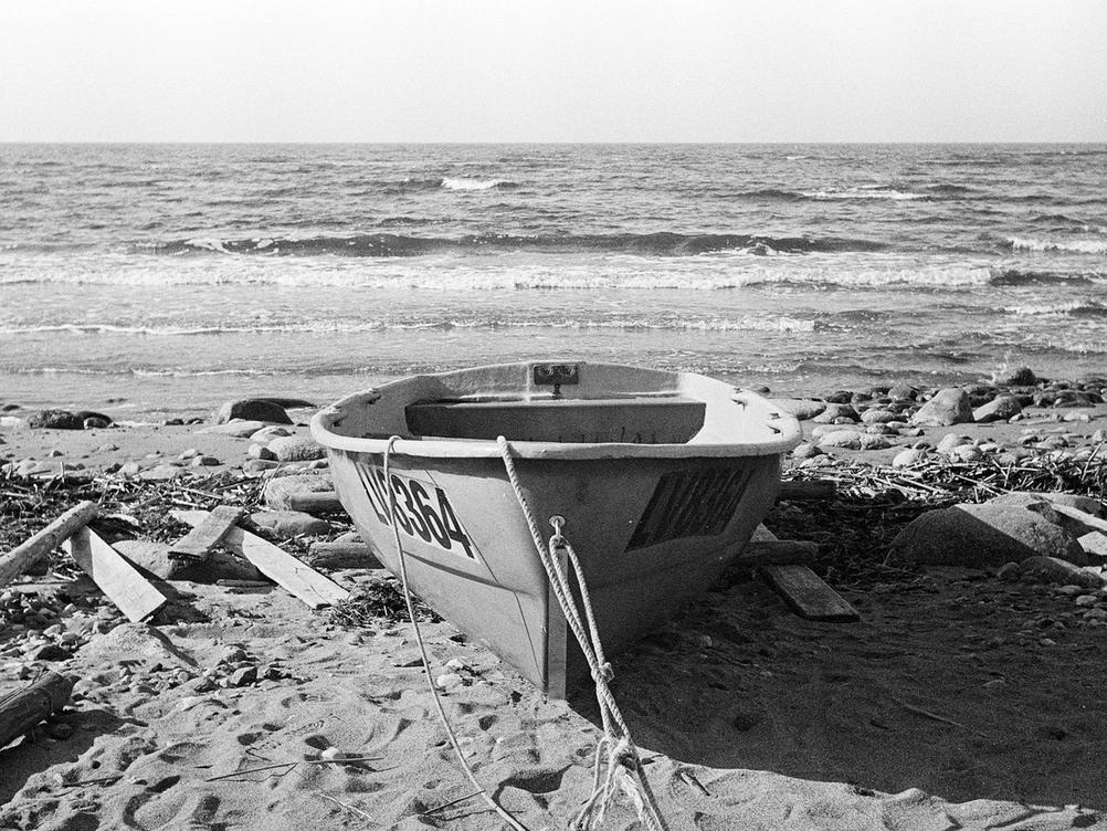 Photo of a boat on a beach.