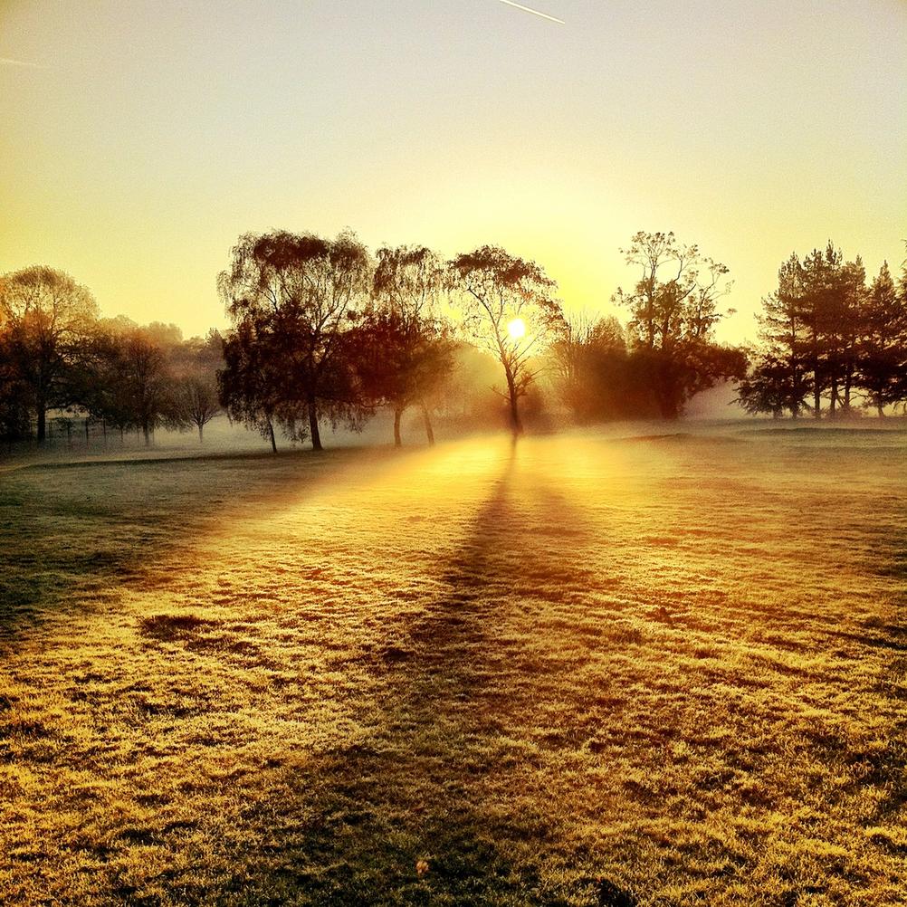 Photo of a misty sunrise.