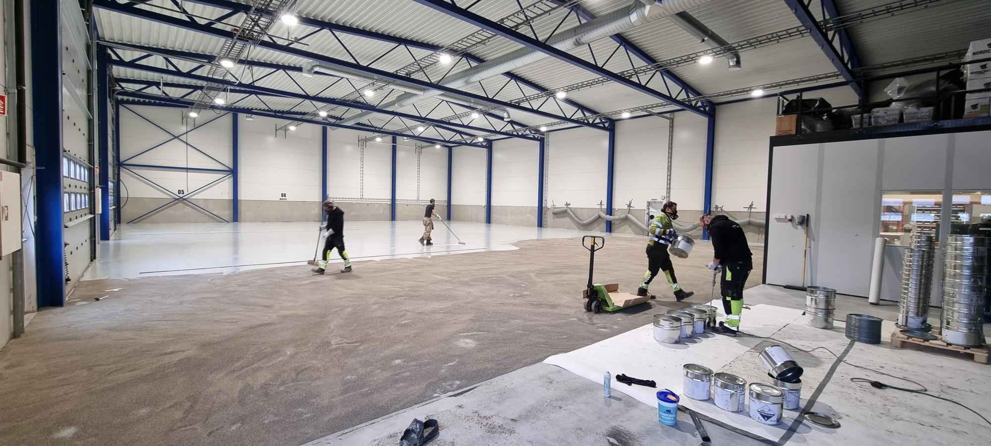 Legging av epoxy gulv 