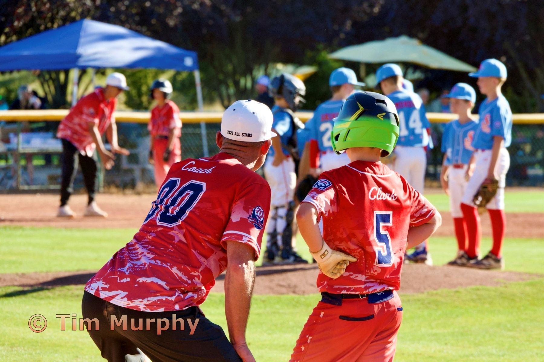 Meeting of the minds: Coaches and players strategize during