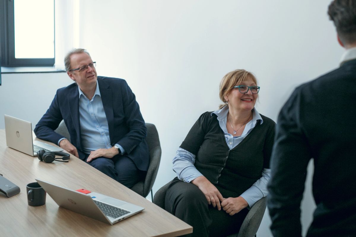GDC Services colleagues discussing a project