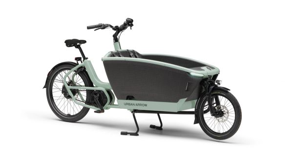 Urban Arrow FamilyNext Pro front-loader cargo e-bike in green, front three-quarter view