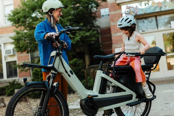 Urban Arrow Breeze ridden by a parent with a child on the rear seat