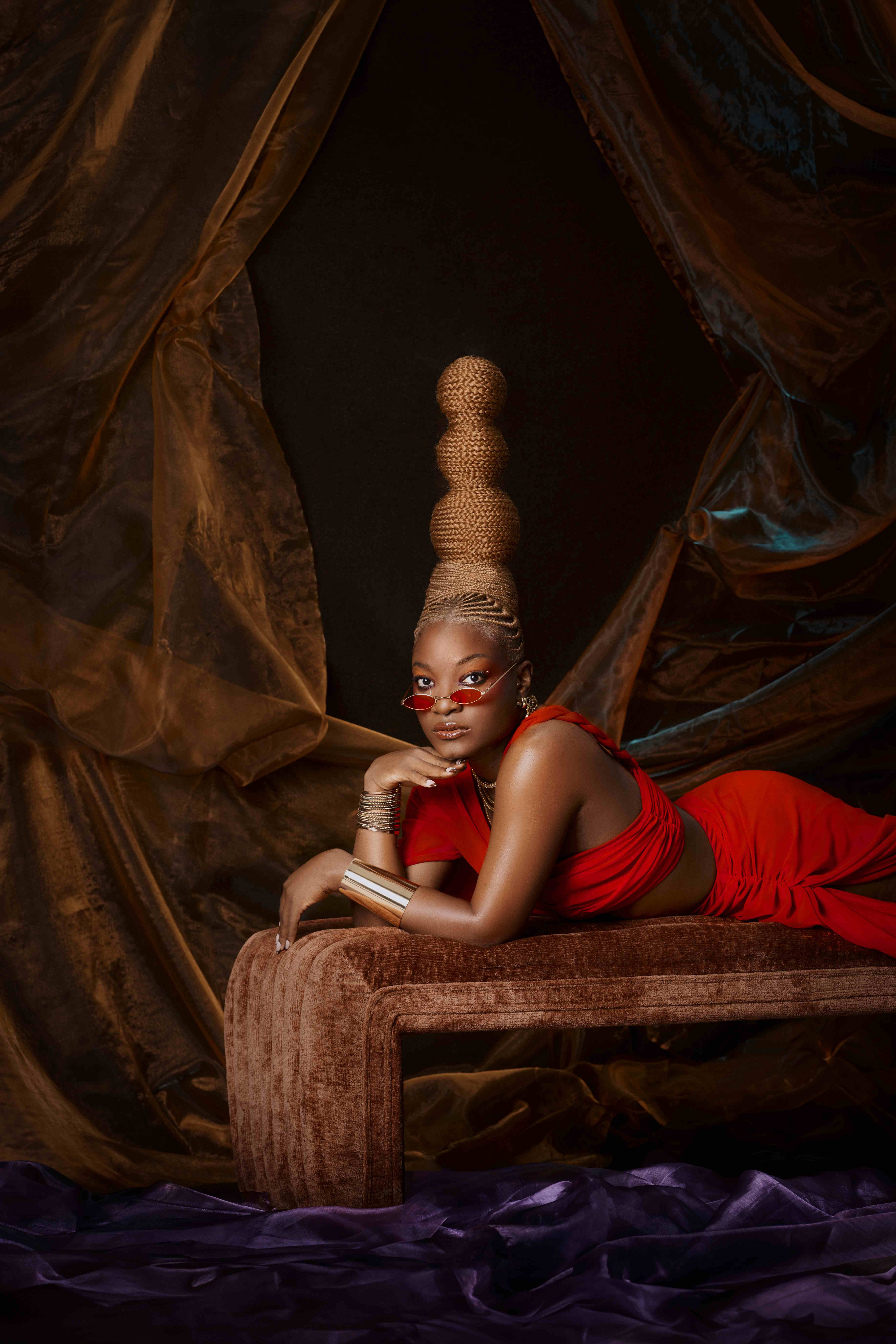 Sadé editorial - red dress lounging