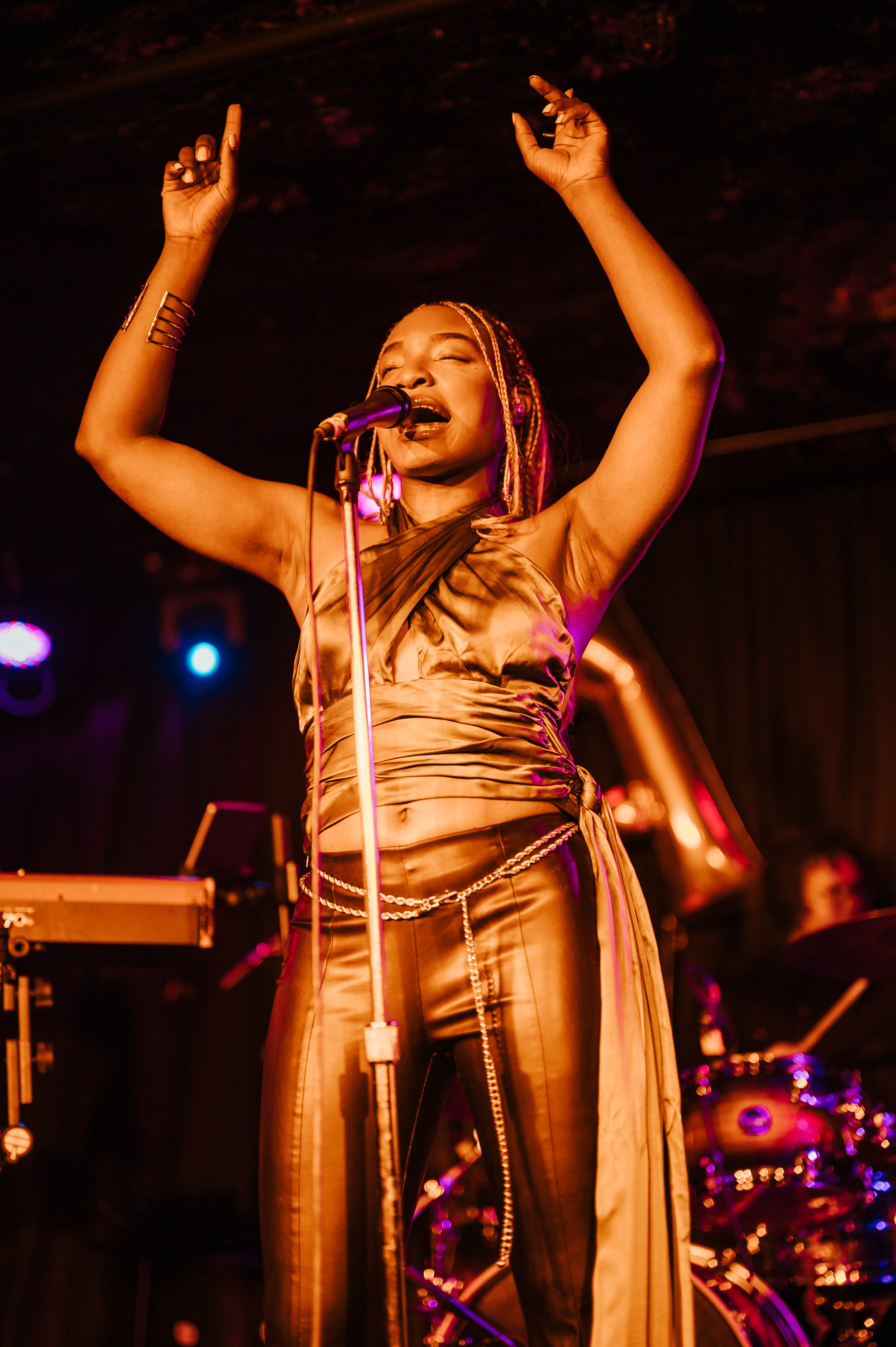 Sadé performing arms raised - ARC Showcase