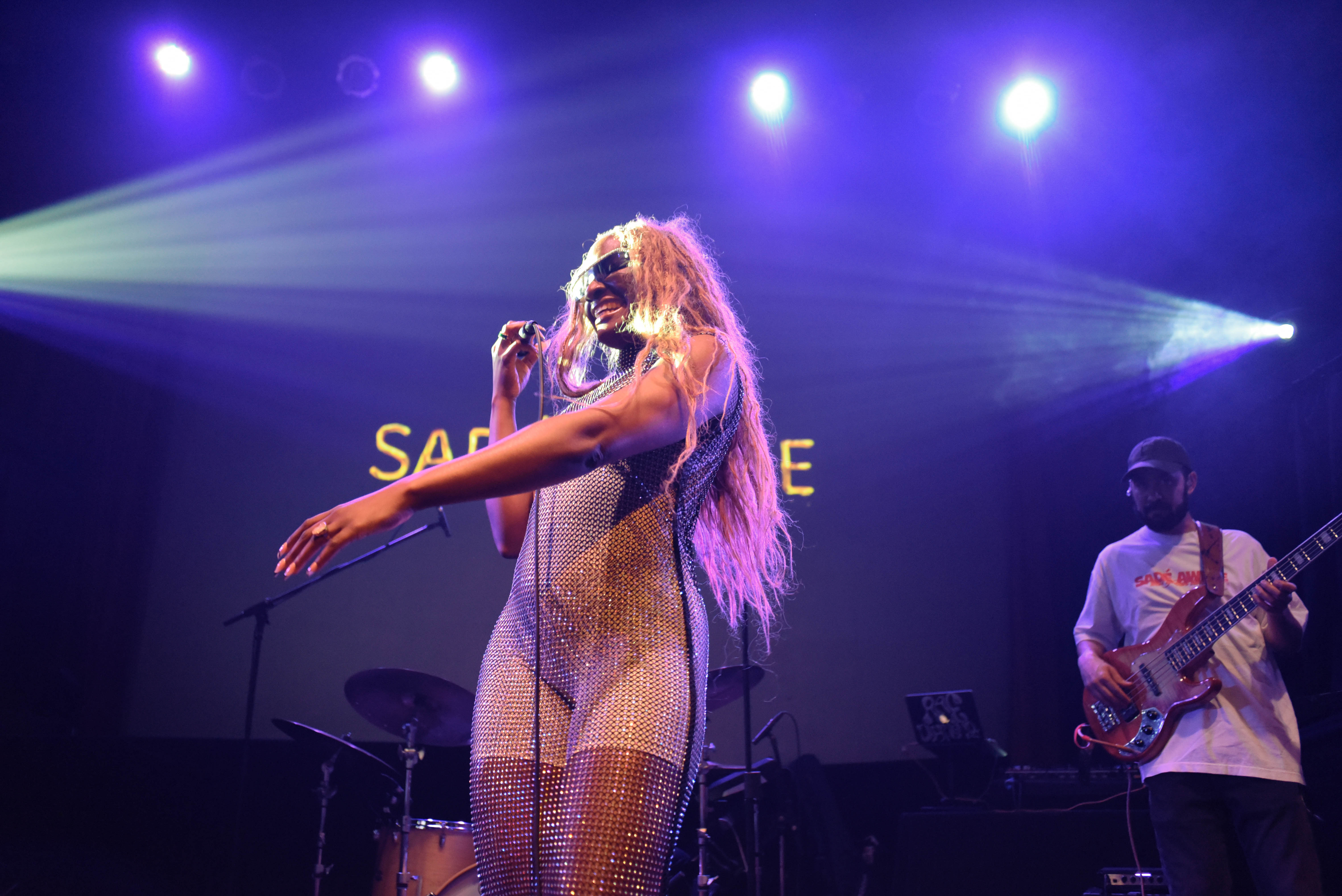 Sadé on stage with band