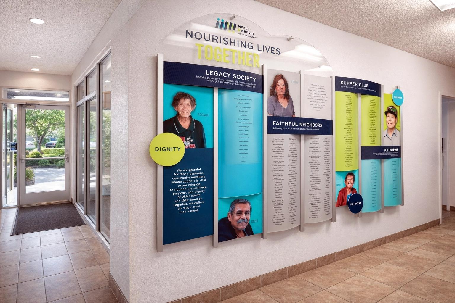 Meals on Wheels donor recognition wall honoring legacy donors, volunteers, and supporters using a modular Rail Wall System.