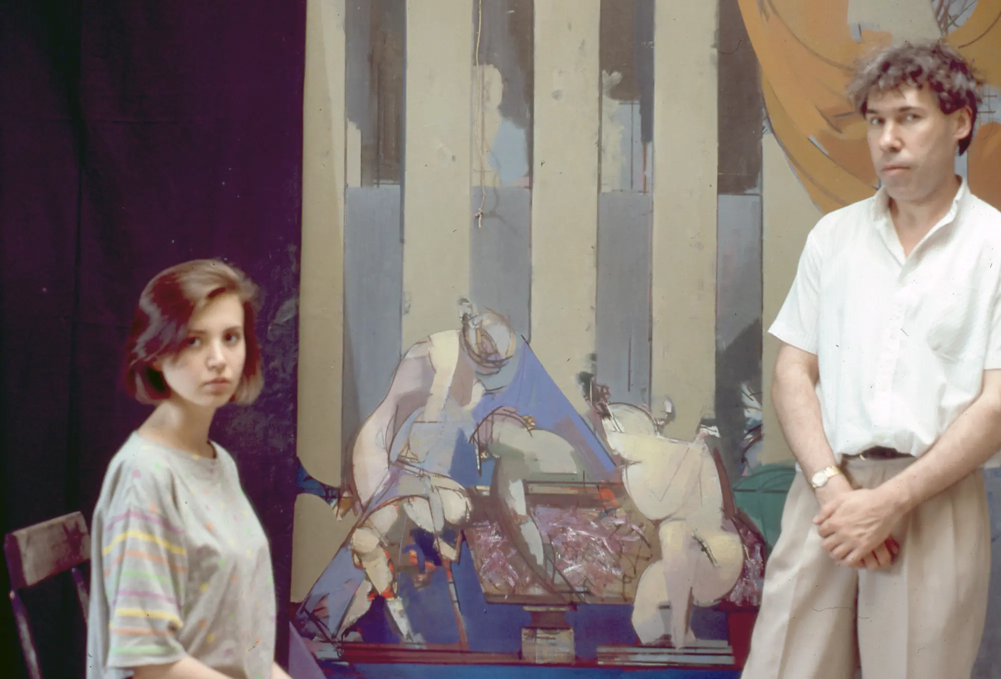 Vasiliy Ryabchenko with his wife Elena in front of work Death of Marat