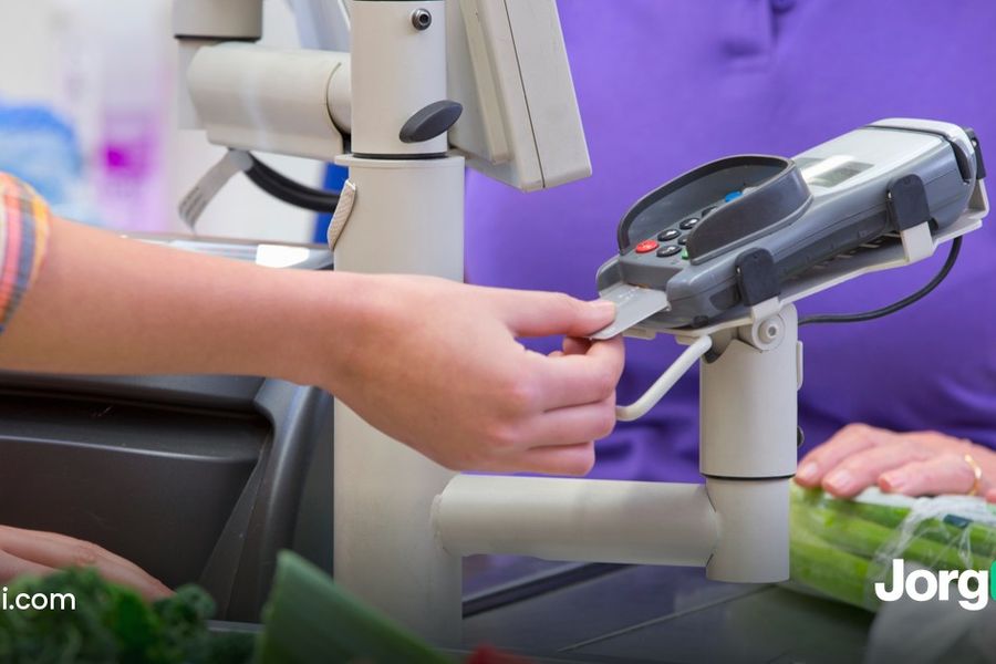 Shopper paying at a supermarket checkout, cover for the October 2026 CPI report preview and the study of S&P 500 moves on CPI days