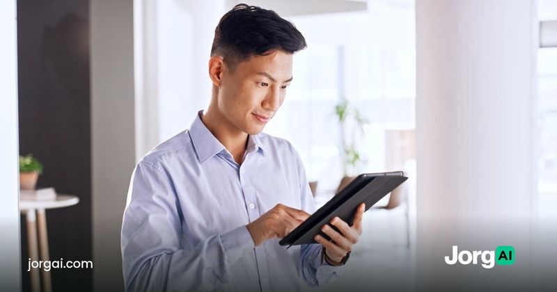 Calm investor reading a tablet in a bright office, illustrating how to trade stock market volatility without panic